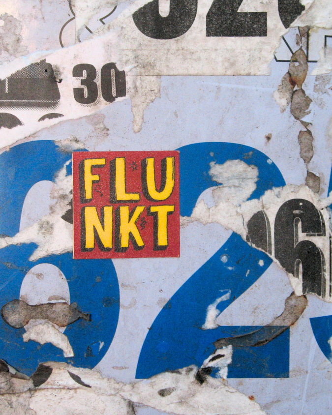 Collage of vintage license plates with a 'FLUNKT' sticker in the center.